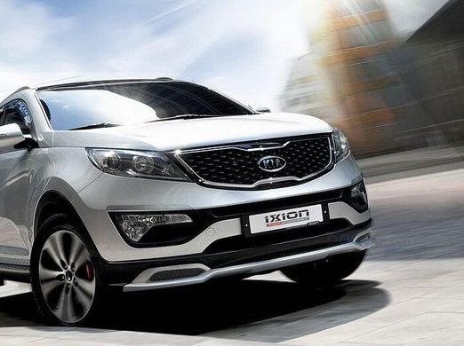 Комплект обвеса ( накладки на бампера, решетка радиатора, реснички на фары) Kia Sportage 2010-2015 г.в.